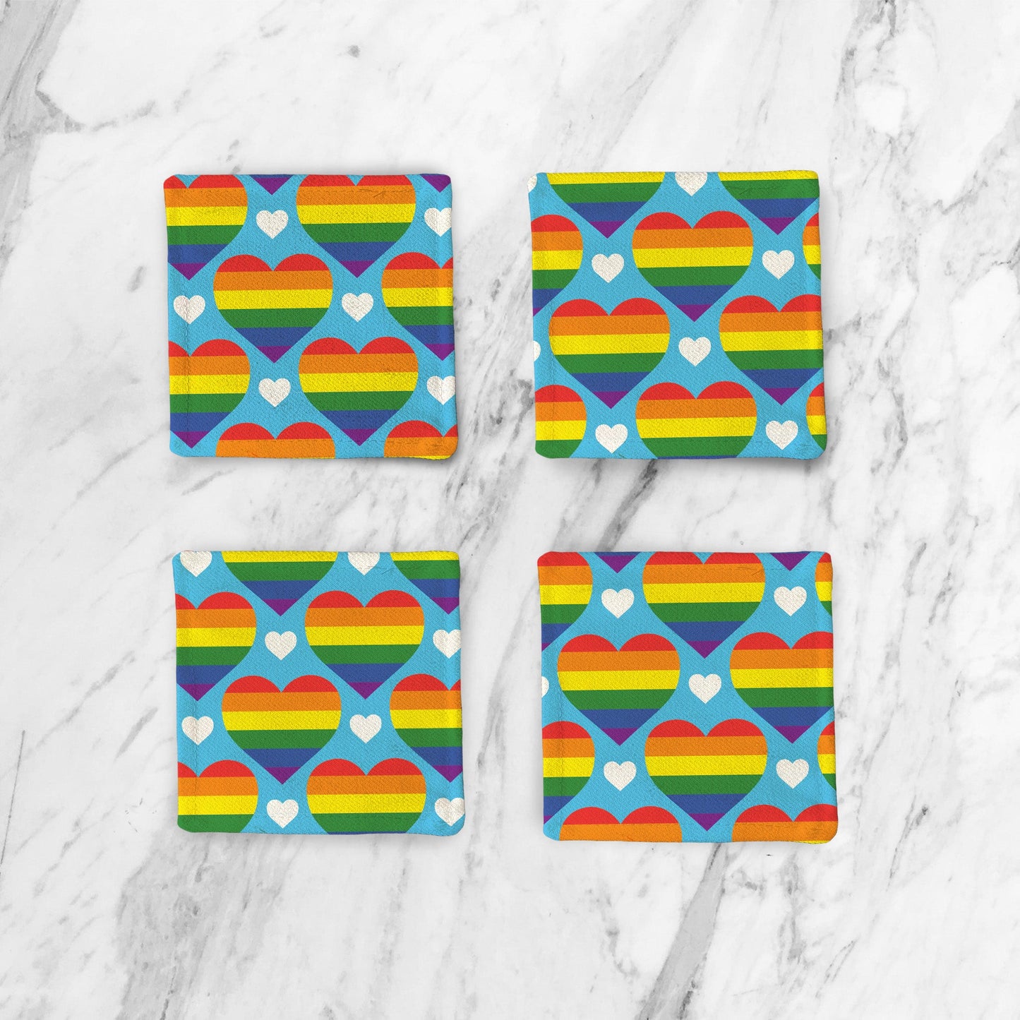 A set of 4 Cotton Twill Coasters, in pride pattern in marbel background