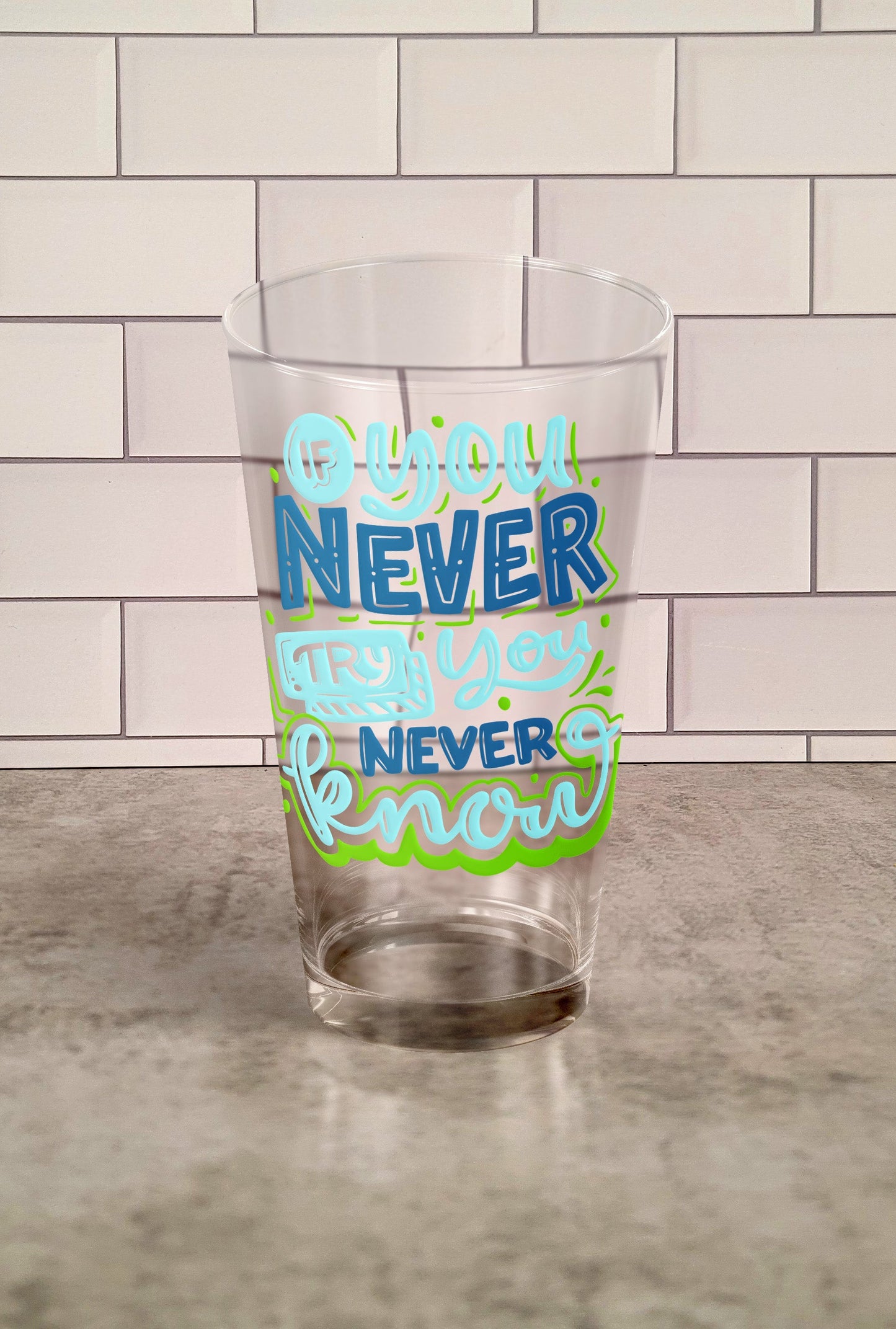 if You Never Try You Never Know transparent Tumbler Glass against a slipslap wall