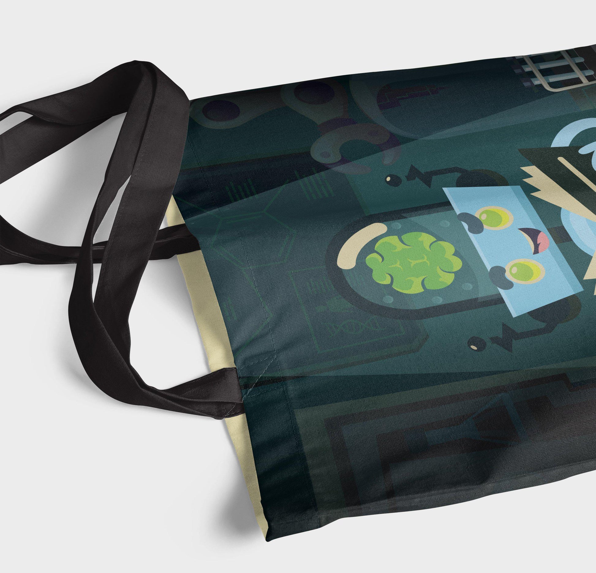 Close-up of an alien school tote bag lying on white surfce