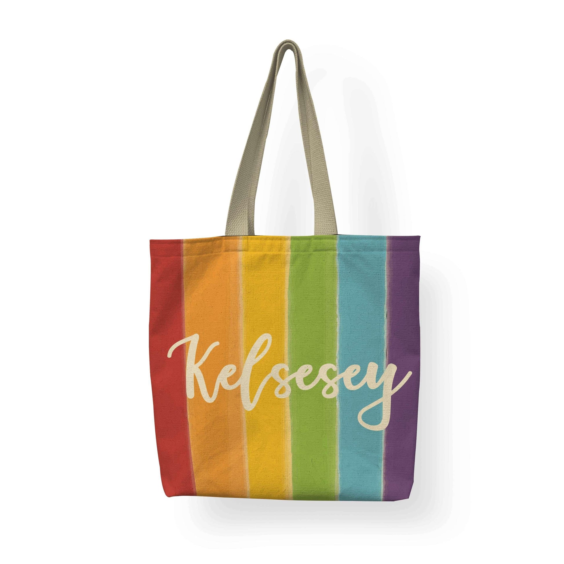 A Watercolor Stripe LGBTQ Pride Tote bag with customized named Kelsesey