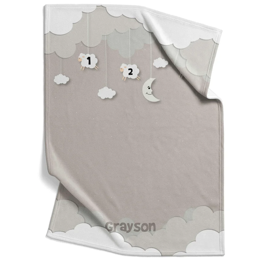 Counting sheep baby blanket personalized with custom name in calming gray fleece design
