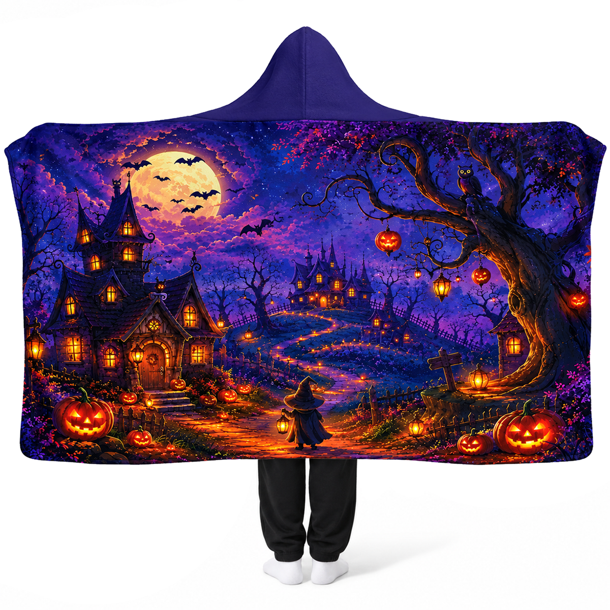 Haunted village Halloween hooded blanket worn as cozy atmospheric fall season wrap
