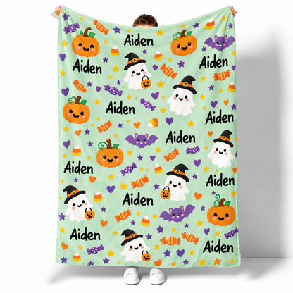 Personalized cute Halloween throw blanket with custom name in fun spooky fleece design
