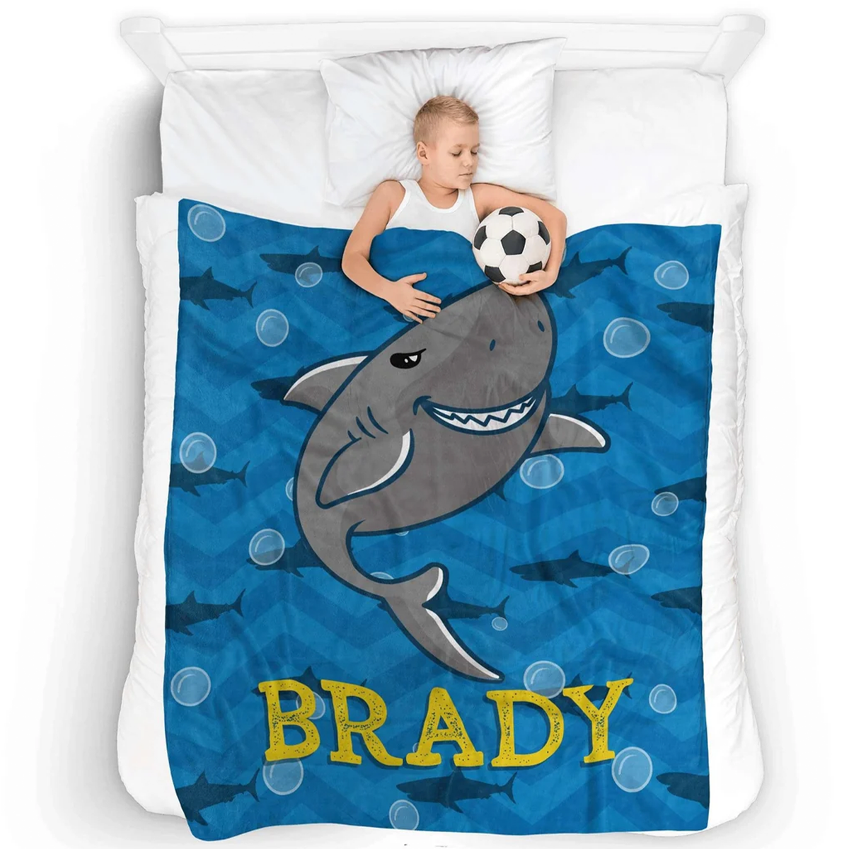 Close-up of custom name on sharky bubbles kids polyester fleece throw blanket
