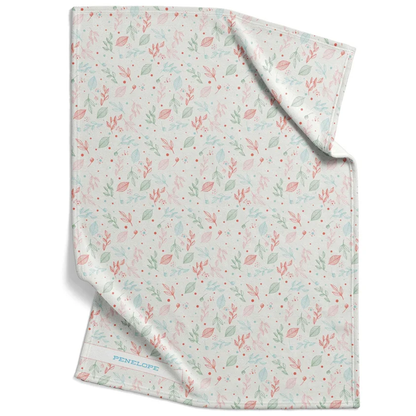 Floral swaddle blanket personalized with custom name in soft floral design for newborns

