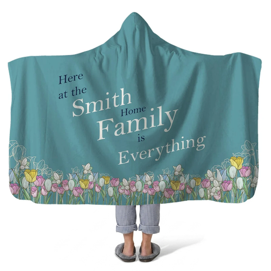 family last name personalized hooded fleece blanket with custom name in warm family design
