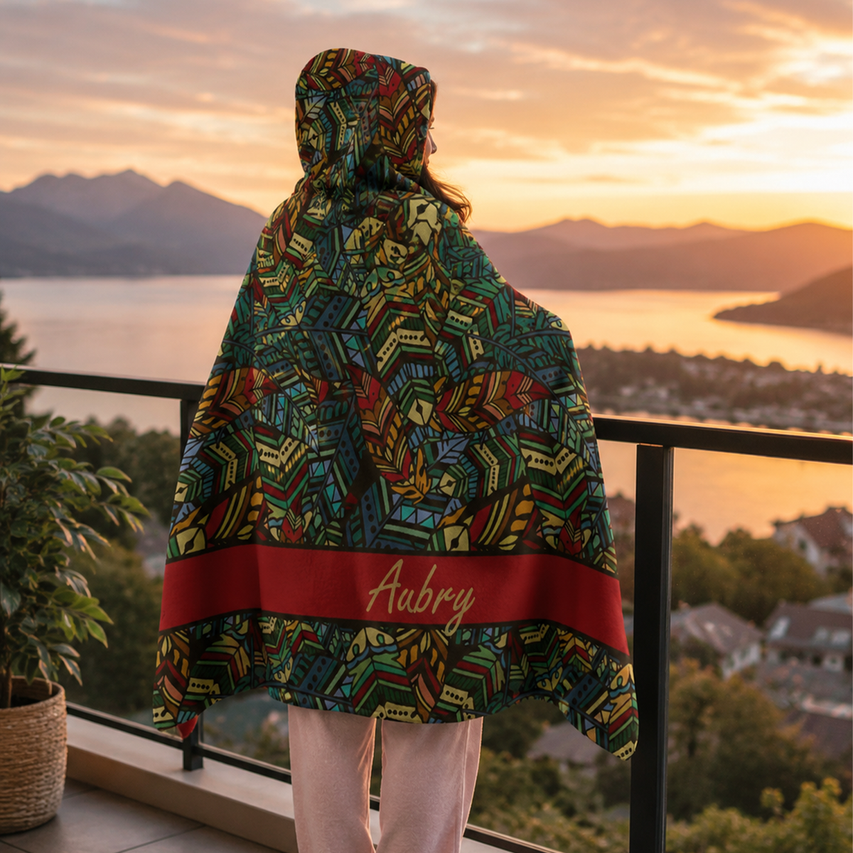 Person wearing personalized bohemian rhapsody hooded blanket as meaningful birthday gift

