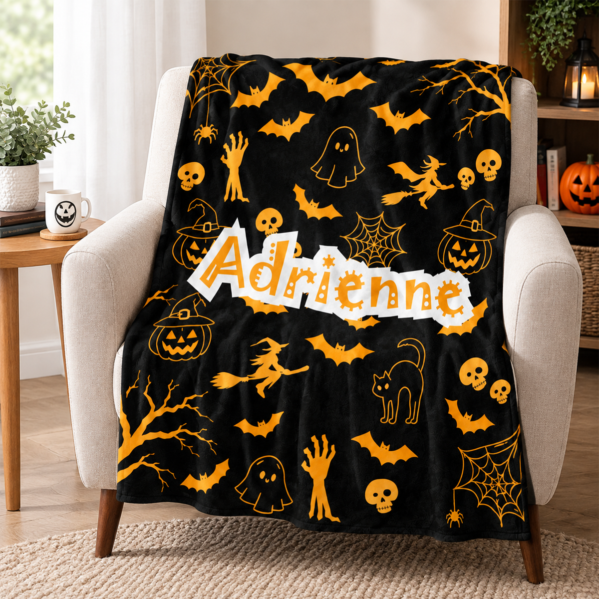 Custom name on vibrant pumpkin Halloween fleece throw blanket as personalized spooky gift
