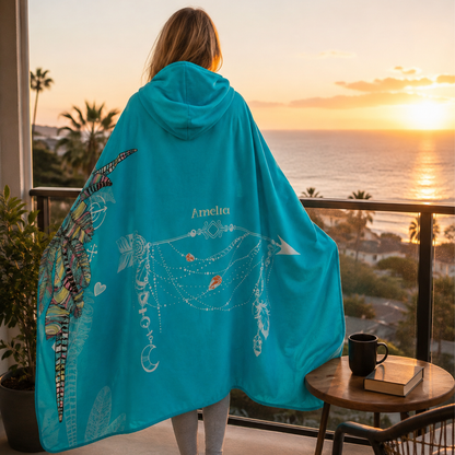 Person wearing personalized drifter hooded blanket as meaningful birthday gift
