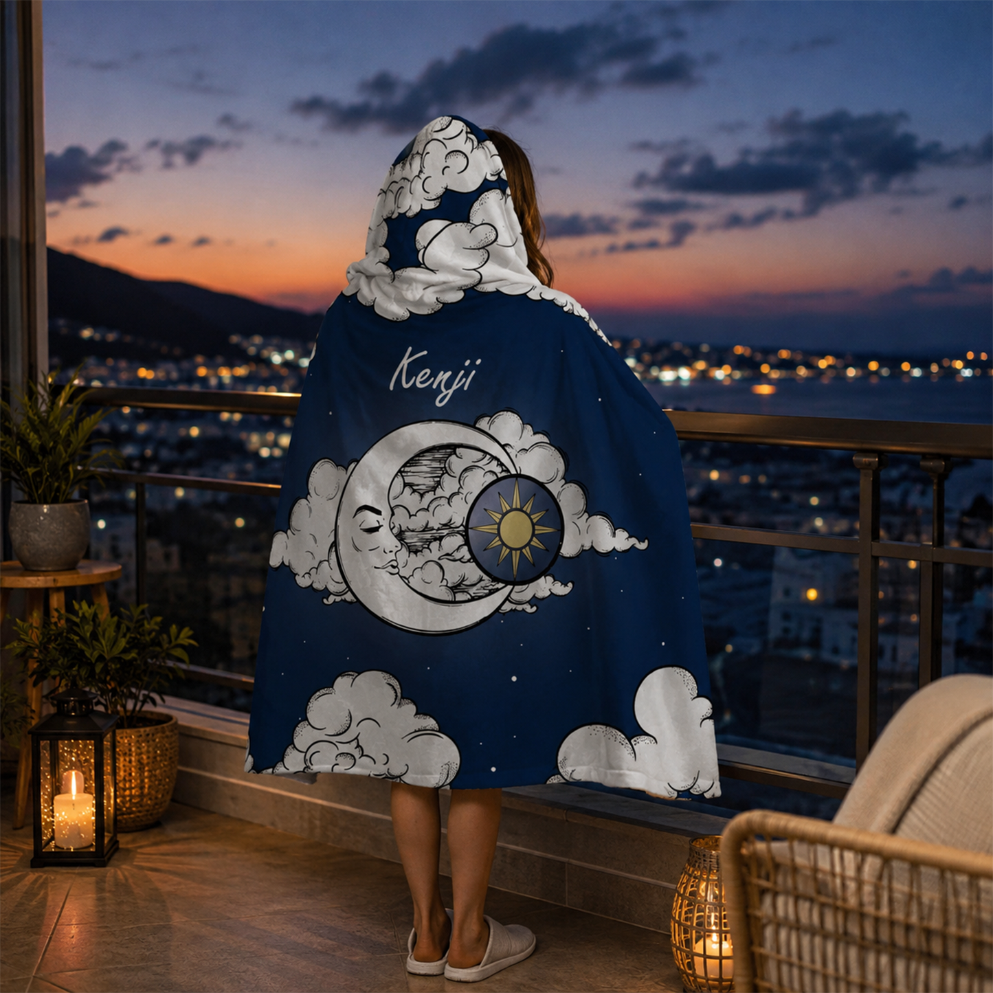 Person wearing personalized night sky hooded blanket as meaningful birthday gift
