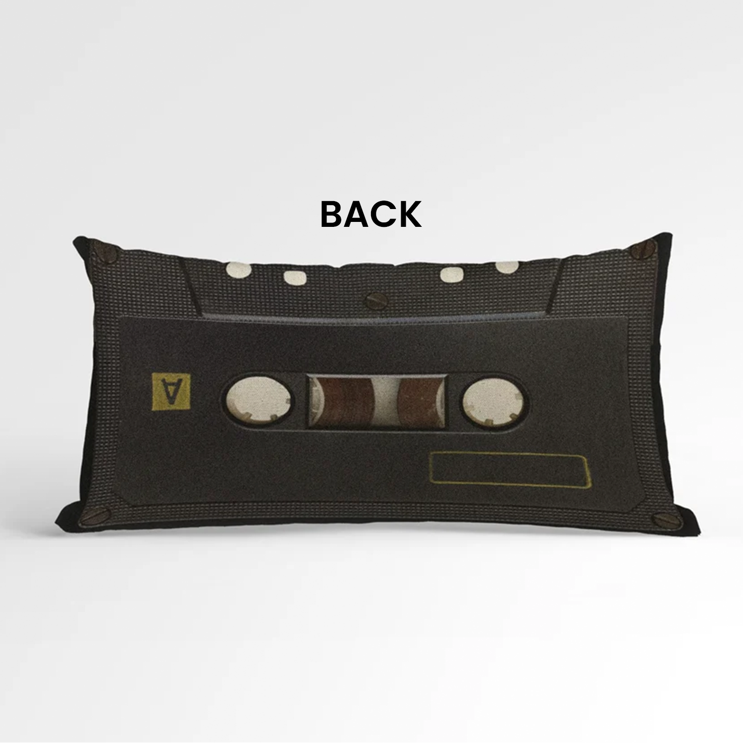Personalized cassette tape pillow on couch showing full retro cotton cover design
