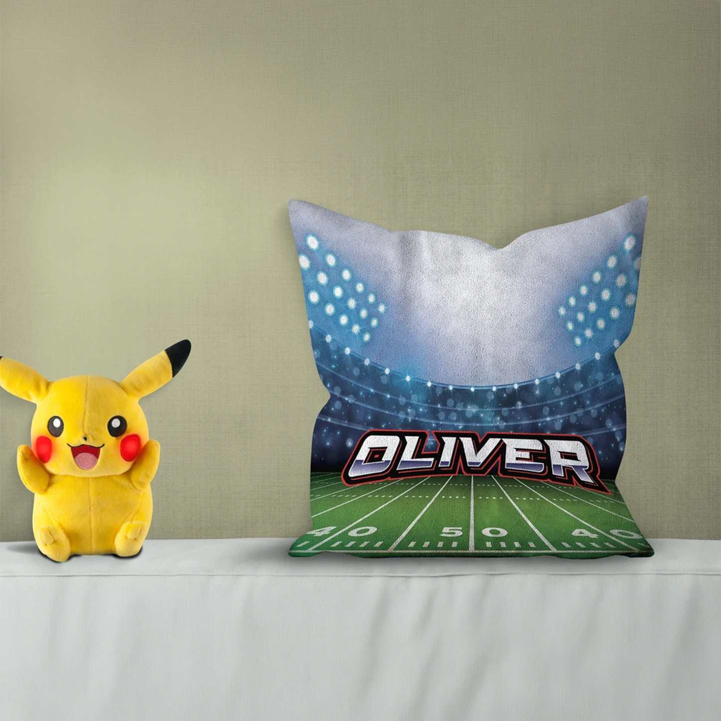Football field personalized throw pillow with custom name in bold sports design
