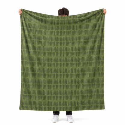 Close-up of custom name on green tribal polyester fleece throw blanket detail
