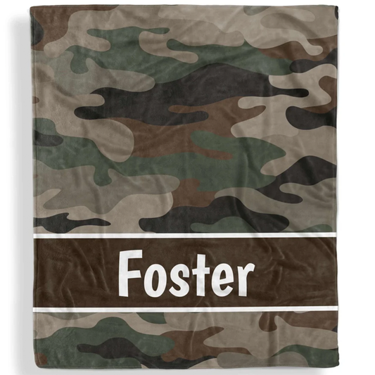 Camouflage kids throw blanket personalized with custom name in bold camo fleece design
