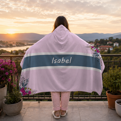 Person wearing personalized pink peddling hooded blanket as meaningful birthday gift
