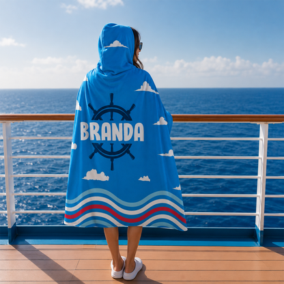 Person wearing personalized ocean breeze hooded blanket as meaningful birthday gift
