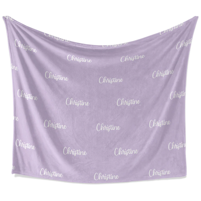 Close-up of custom name on personalized color fleece throw blanket vivid design
