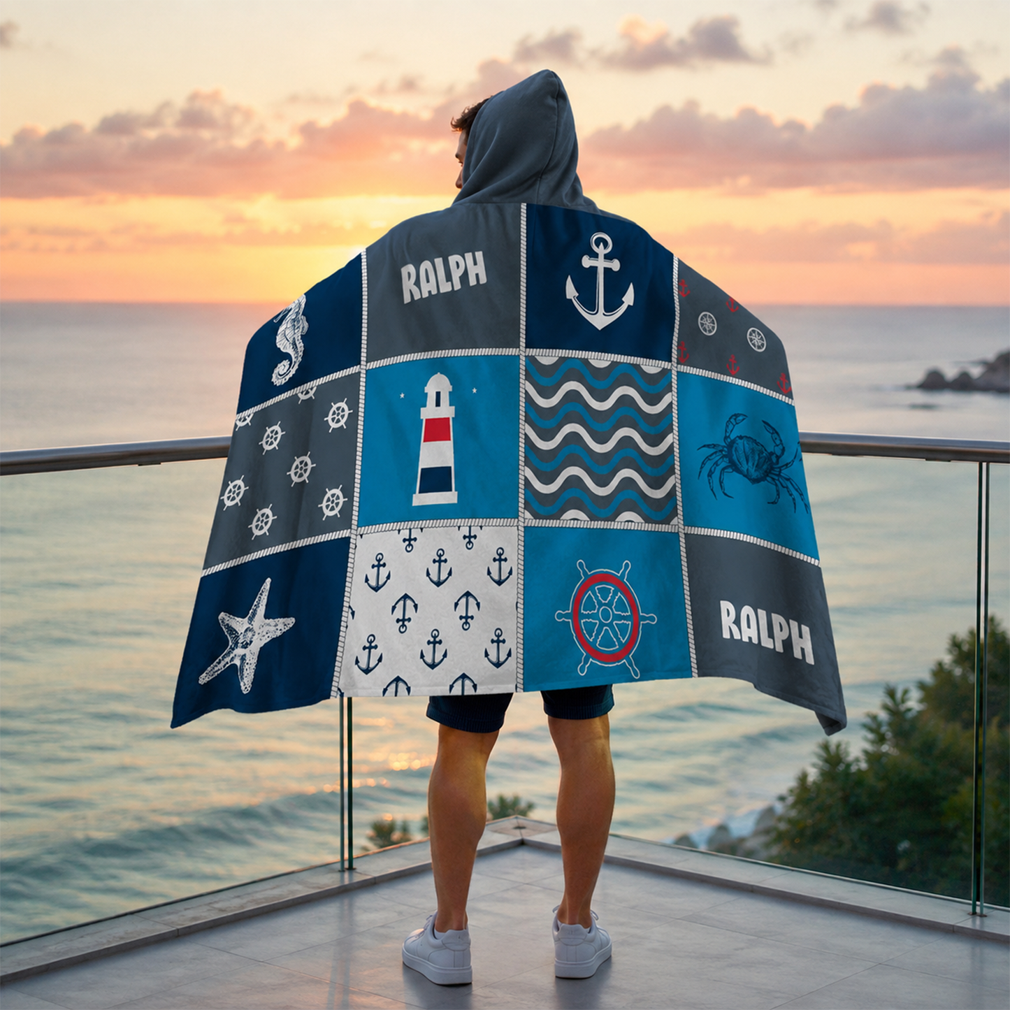 Person wearing personalized sea grid hooded blanket as meaningful birthday gift
