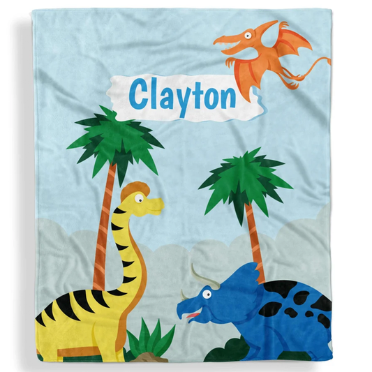 Cute dinosaur kids throw blanket personalized with custom name in fun fleece design

