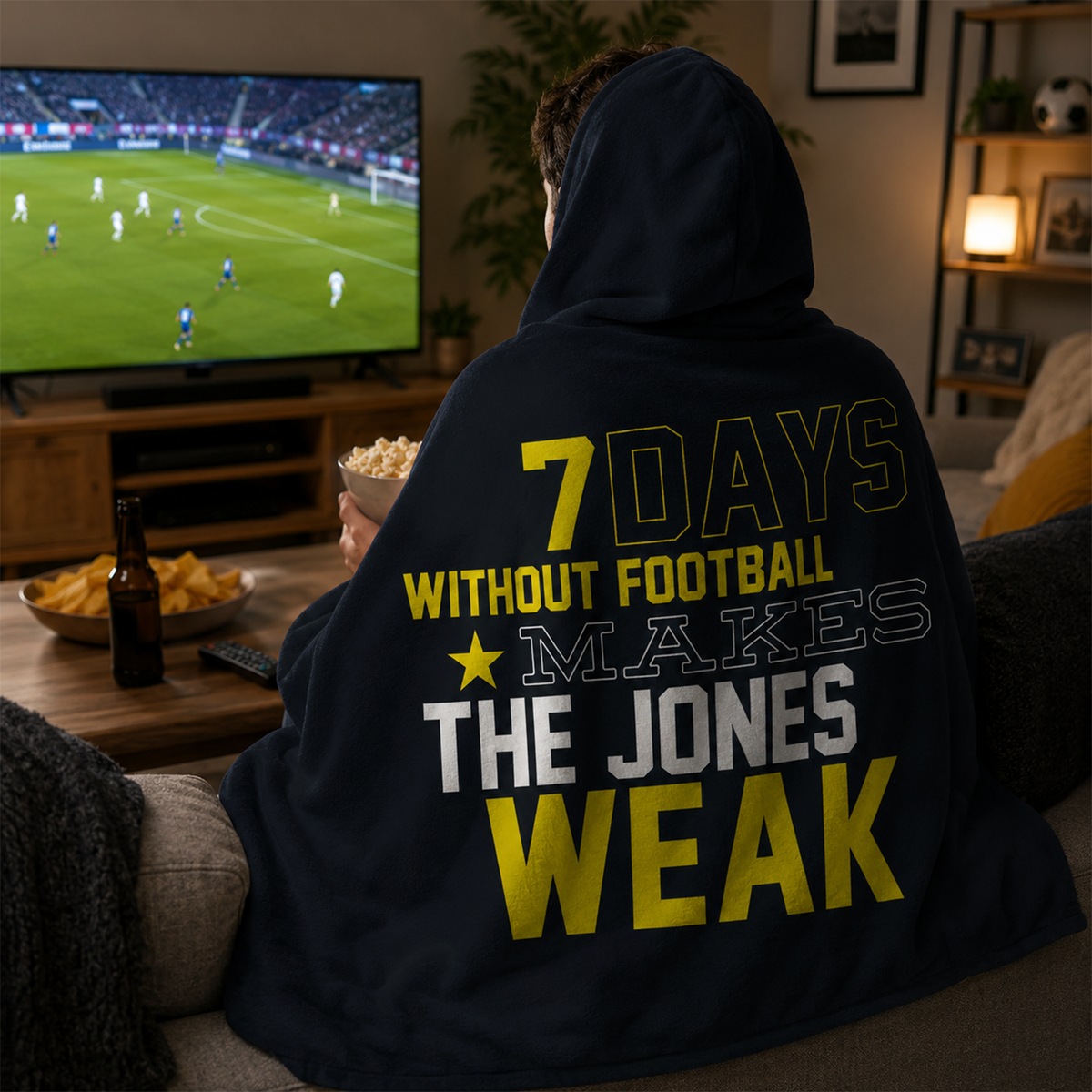 Person wearing personalized football fan fomo hooded blanket as meaningful birthday gift
