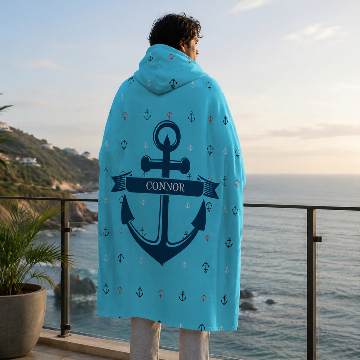 Person wearing personalized bluepeter hooded blanket as meaningful birthday gift
