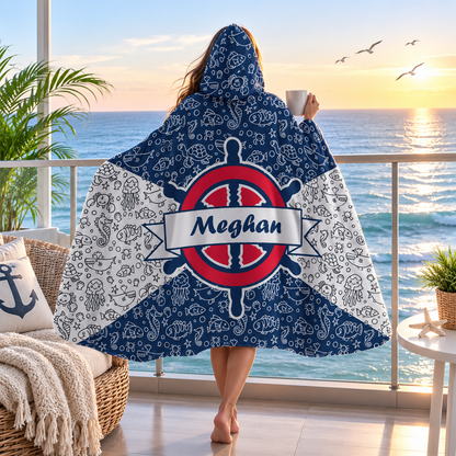 Person wearing personalized backstay hooded blanket as meaningful birthday gift
