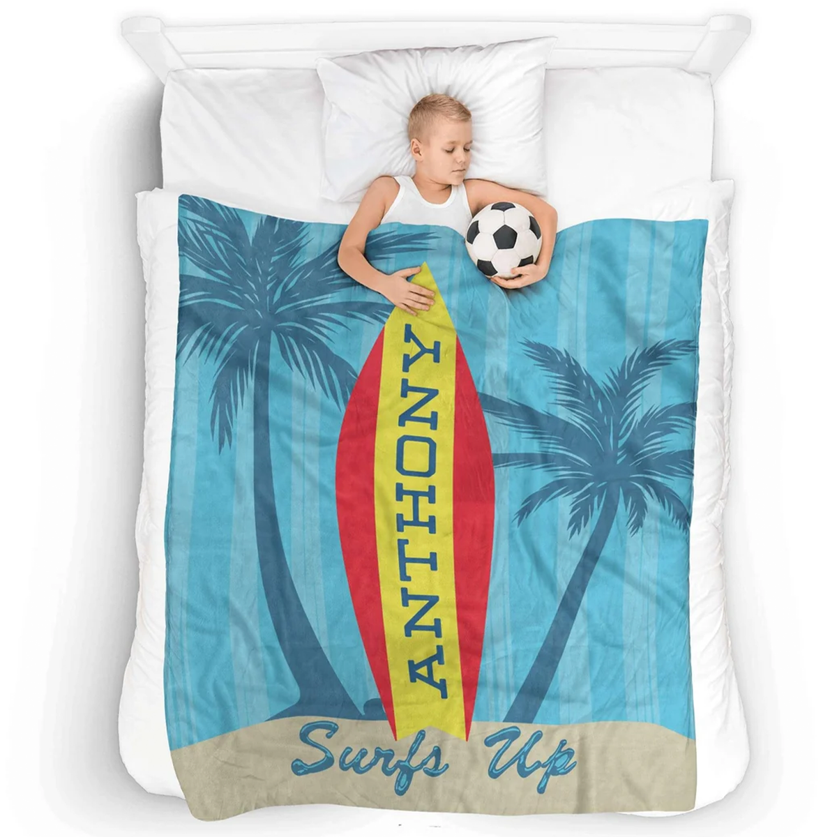 Child wrapped in personalized surfs up throw blanket as birthday summer beach gift
