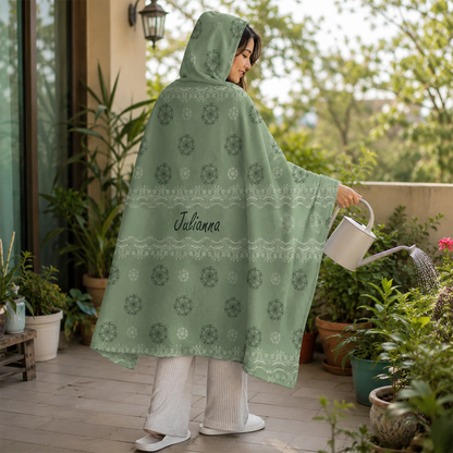 Person wearing personalized doily dots hooded blanket as meaningful birthday gift
