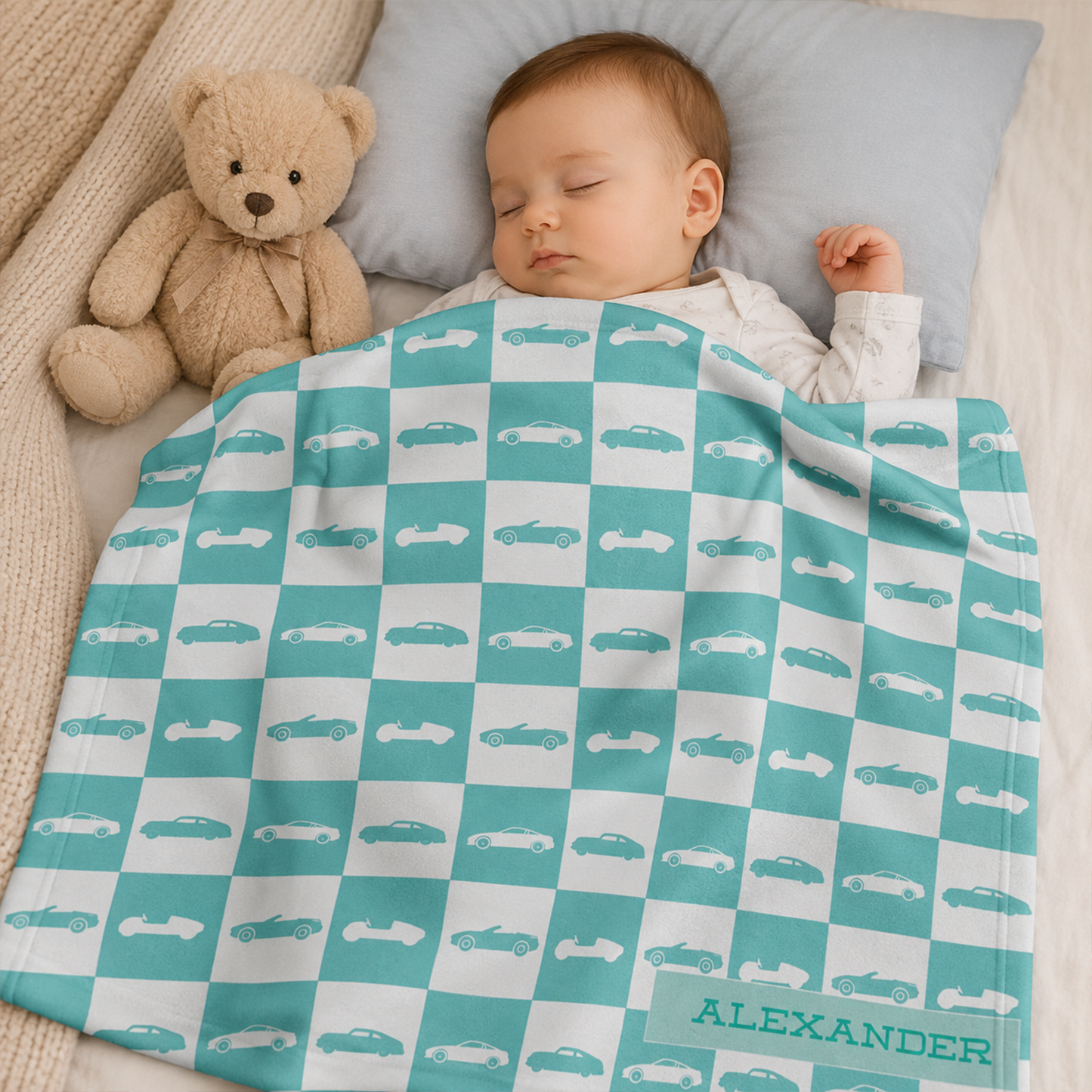 Baby boy wrapped in personalized race car vintage fleece blanket as shower gift
