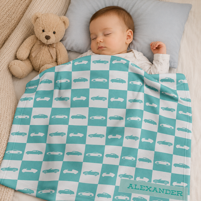 Baby boy wrapped in personalized race car vintage fleece blanket as shower gift
