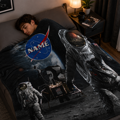 Person wrapped in personalized man on the moon throw blanket as birthday space gift
