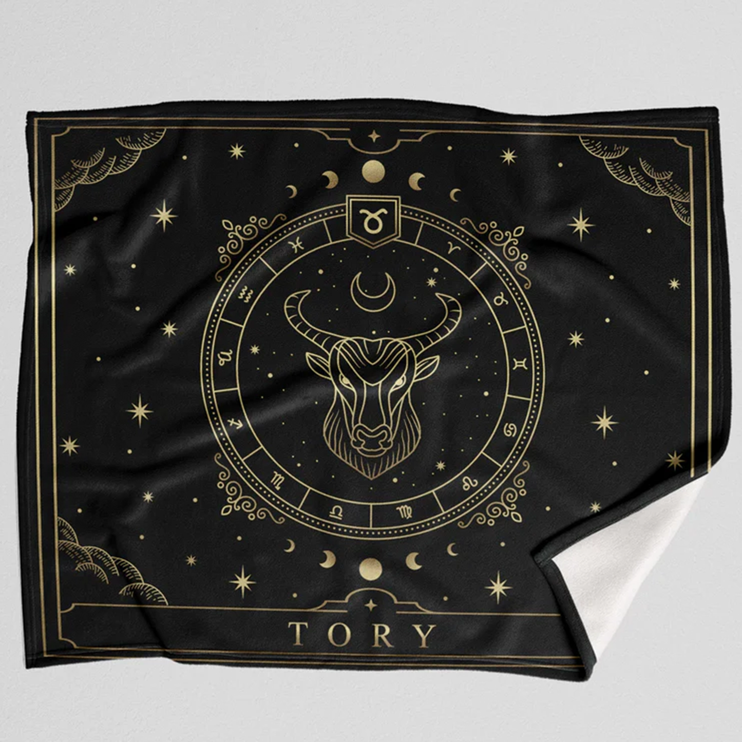 Close-up of custom zodiac star sign detail on personalized fleece throw blanket

