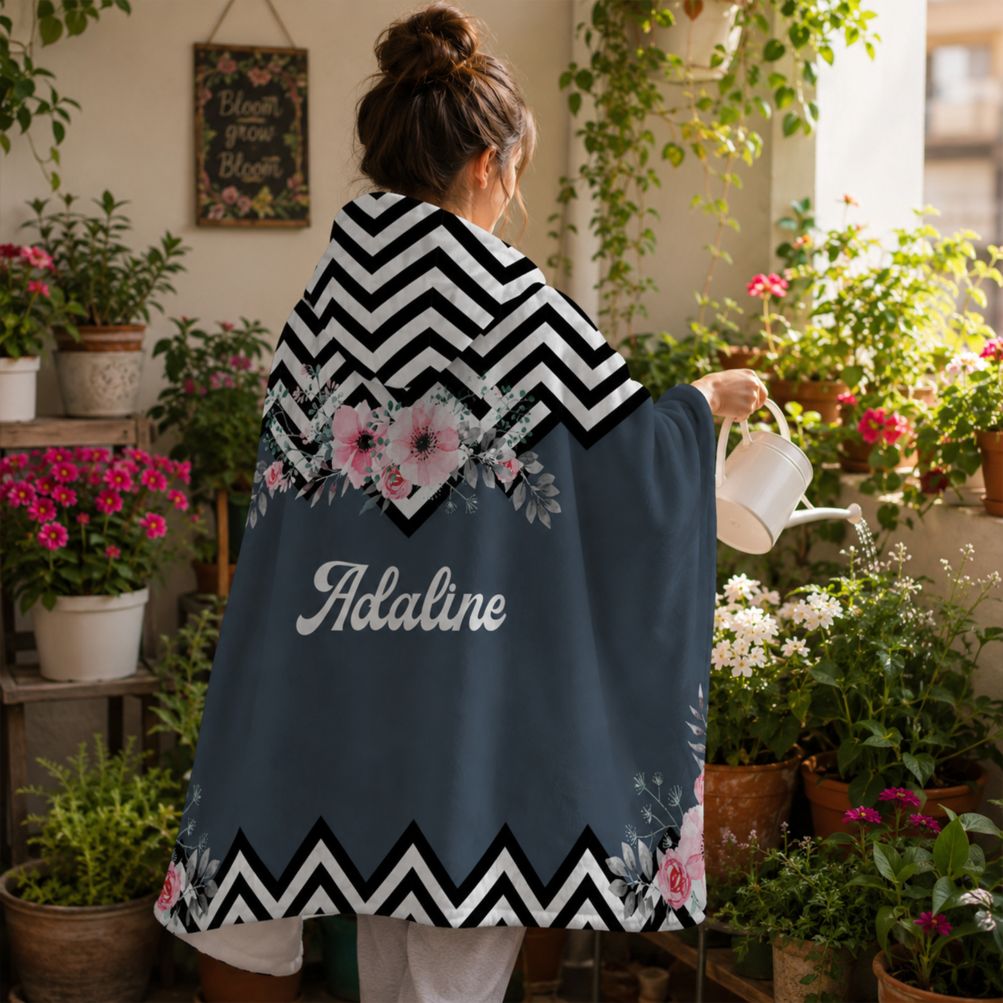 Close-up of custom name on deco eco botanical Minky fleece hooded wearable blanket
