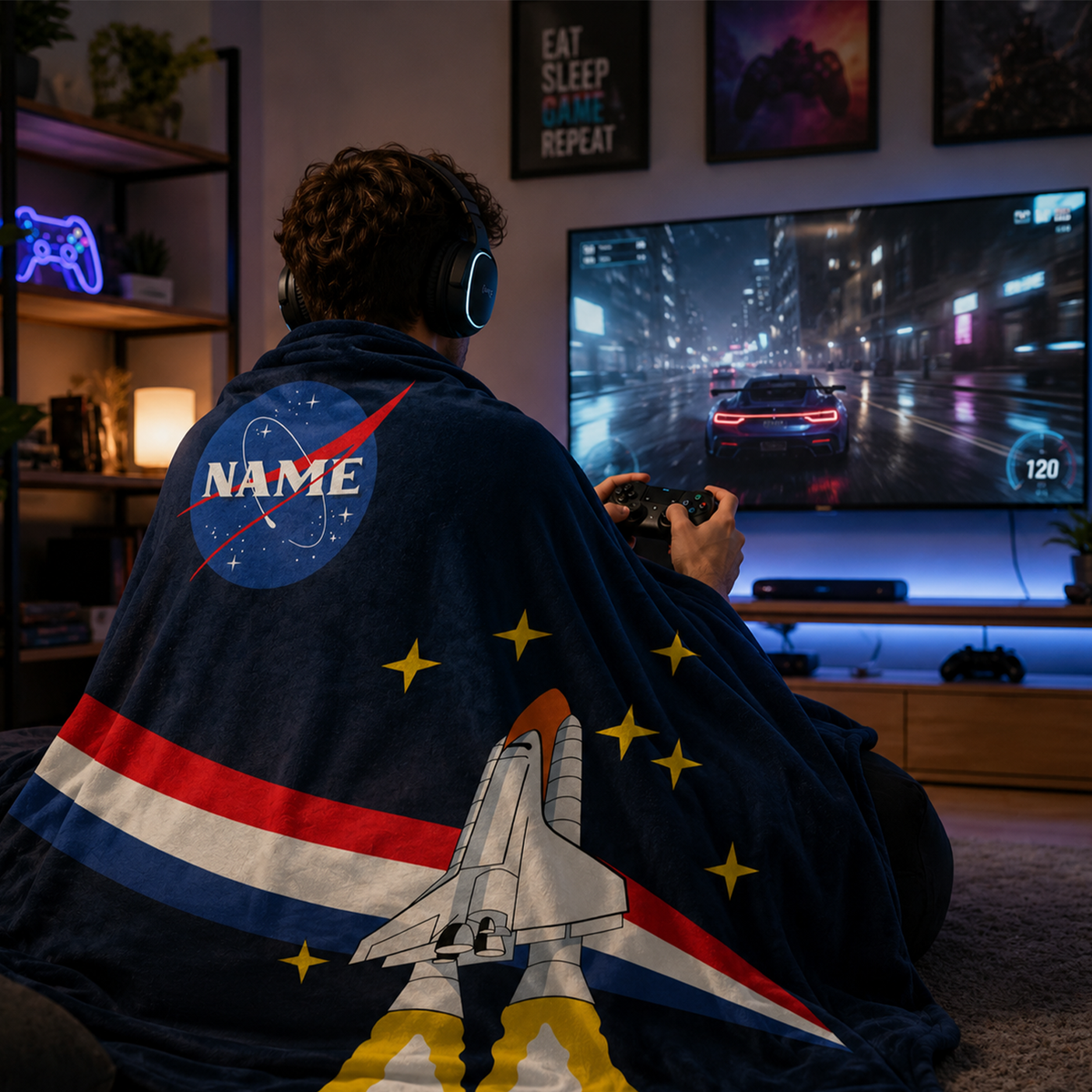 Child wrapped in personalized NASA launch throw blanket as birthday science themed gift

