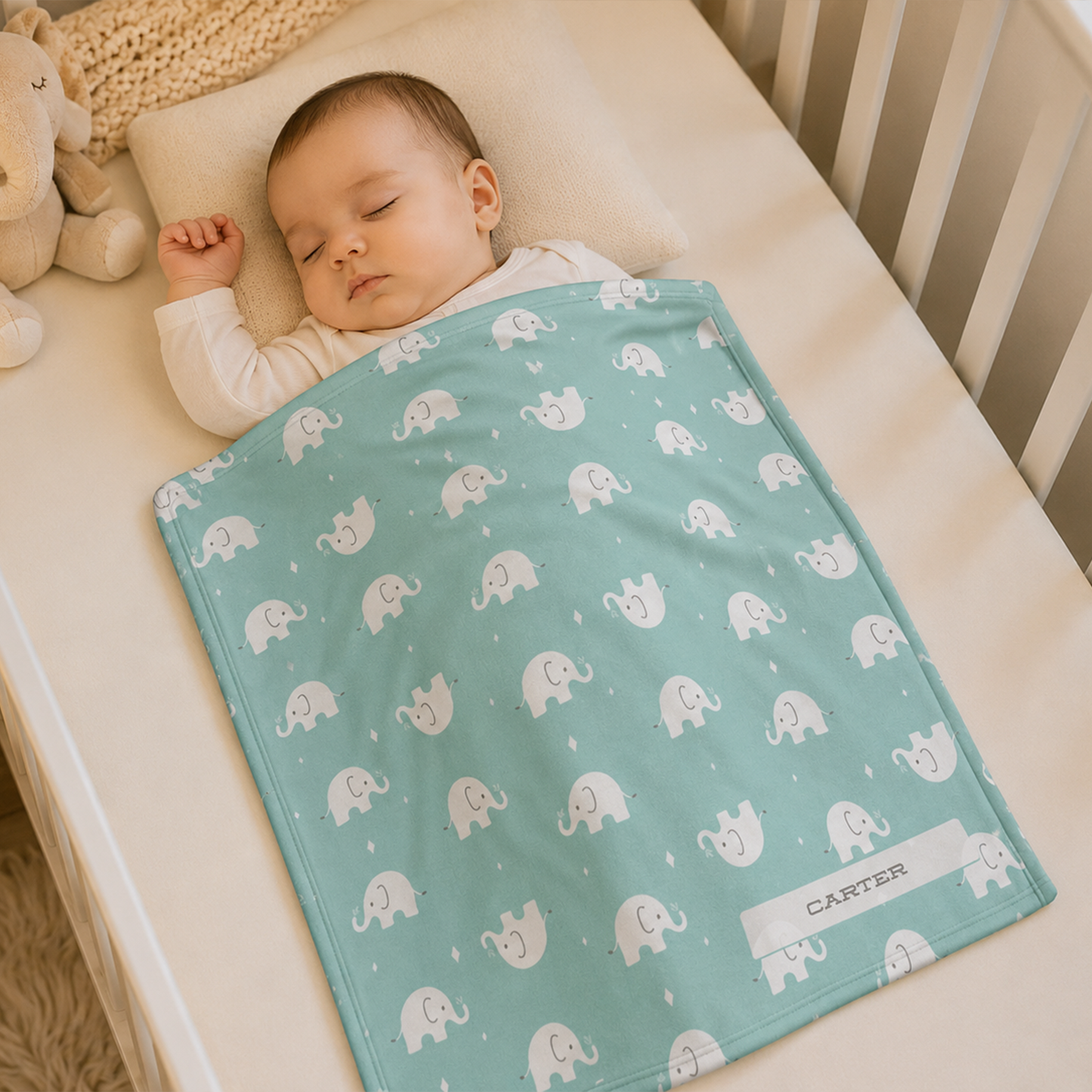 Baby wrapped in personalized elephant seafoam fleece blanket as sweet shower gift
