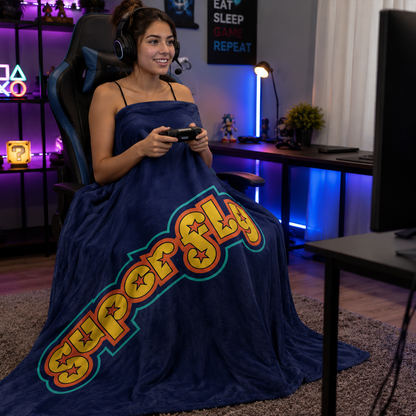Person wrapped in superfly retro throw blanket as funky housewarming birthday gift
