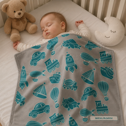 Baby wrapped in personalized toys gray teal fleece blanket as thoughtful shower gift

