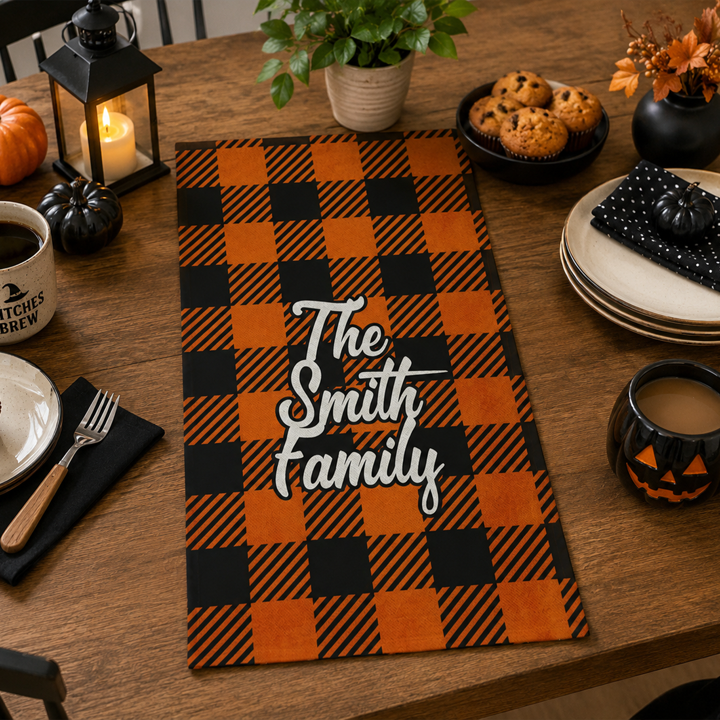 Close-up of custom name on black and orange gingham cotton tea towel 28 by 18 inch
