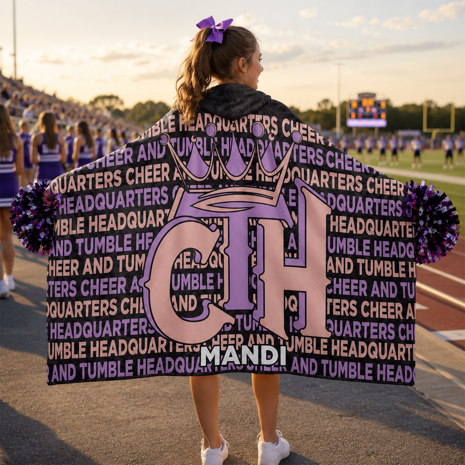 Cheerleader wearing personalized cheer tumble hooded blanket as end of season gift
