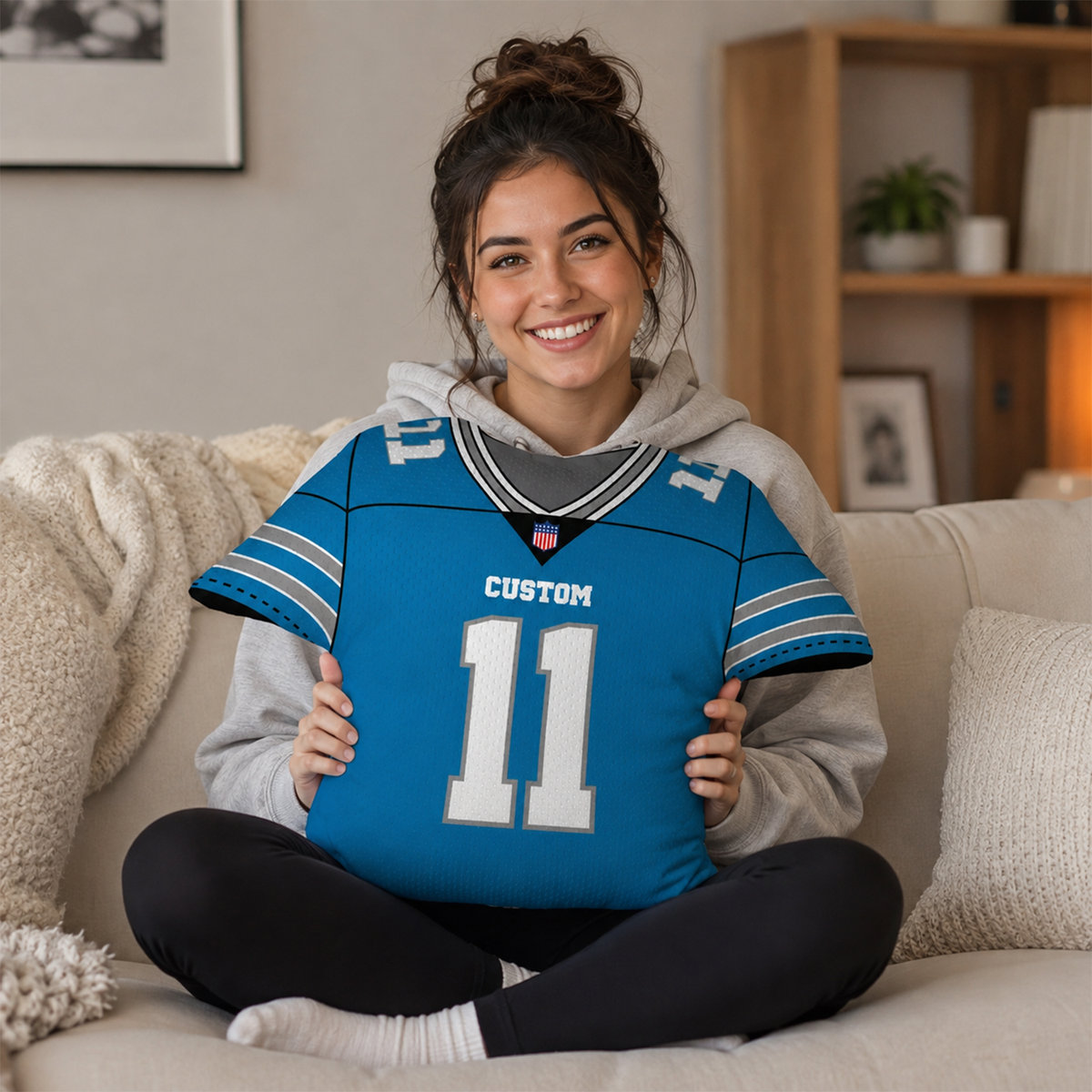 Personalized football jersey pillow in navy blue as team spirit gift for players
