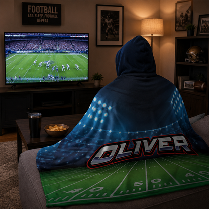 Football fan wearing personalized stadium hooded blanket as birthday sports gift

