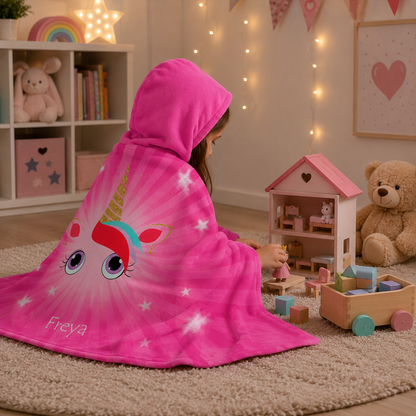 Woman wearing personalized enchantment hooded blanket as magical birthday gift
