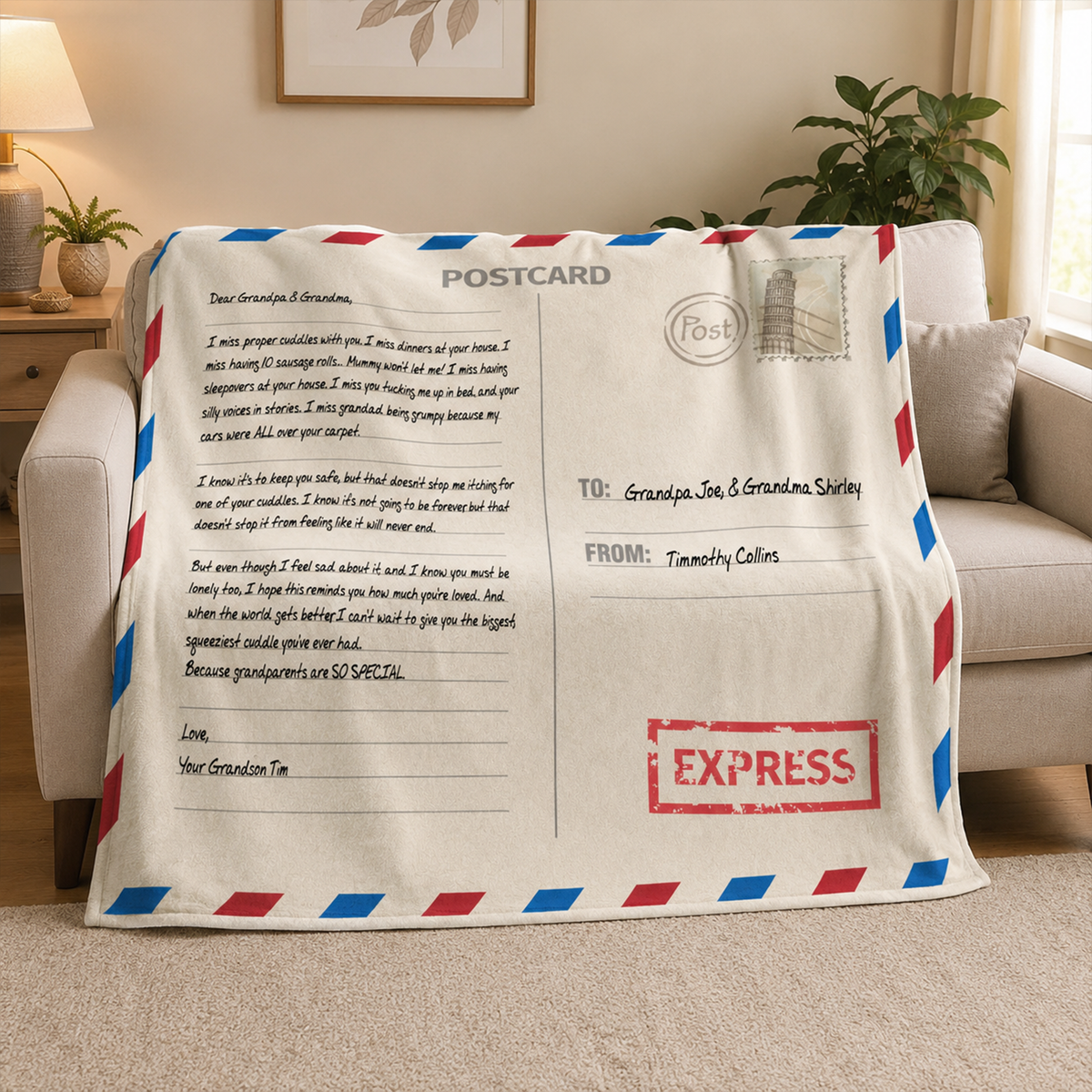 Personalized air mail postcard throw blanket draped over sofa as charming birthday gift