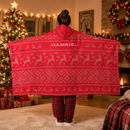 Red Christmas hooded blanket showing vivid festive sweater print and soft Minky texture

