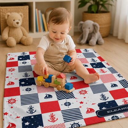Close-up of custom name on sailor nautical blue red fleece baby blanket for boys
