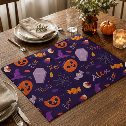 Personalized Halloween trick or treat placemat styled on table as seasonal party gift
