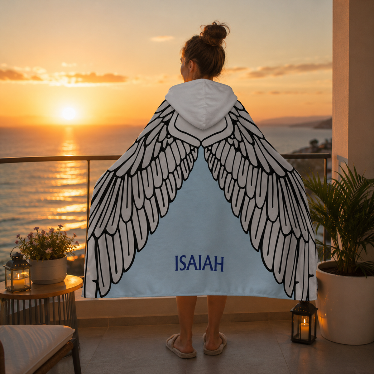 Teen wearing personalized dragon wings hooded blanket as fantasy gaming birthday gift
