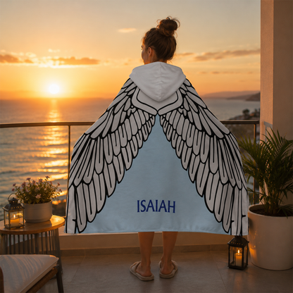 Teen wearing personalized dragon wings hooded blanket as fantasy gaming birthday gift
