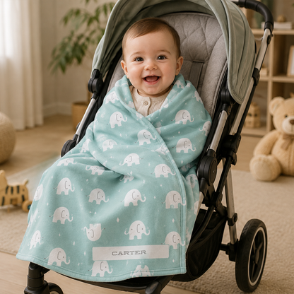 Close-up of custom name on elephant seafoam green fleece baby blanket design
