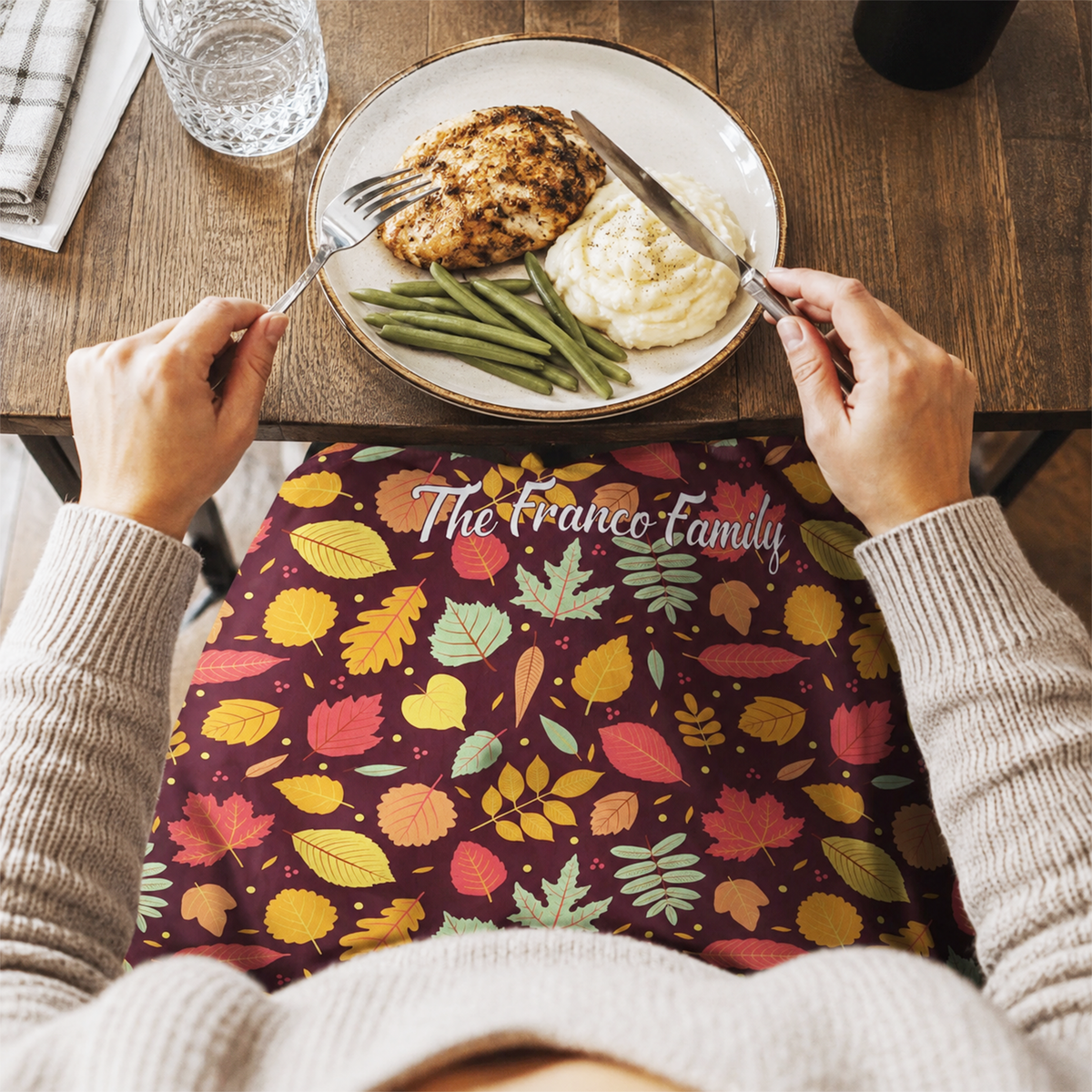 Personalized fall plaid placemat styled on autumn dinner table as housewarming gift
